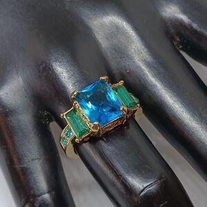 Gold Toned Ring with Blue and Green Gemstones